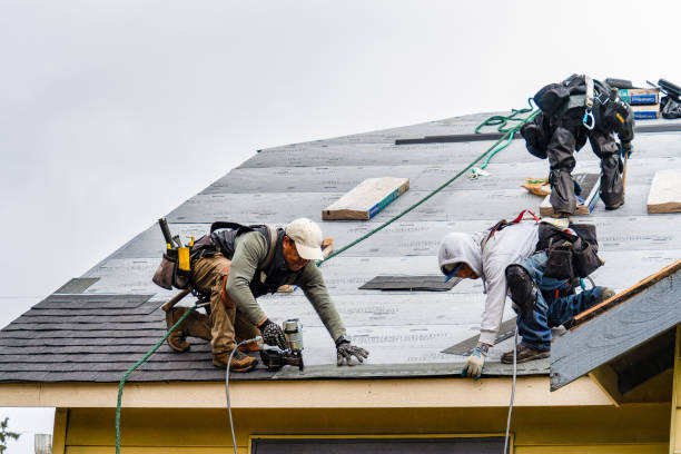 Professional Flat Roof Repair technician working in Woodbury, PA